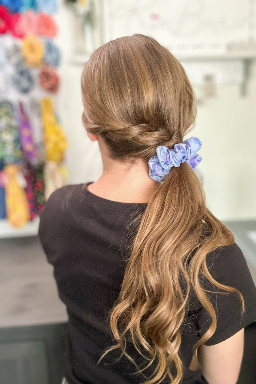 Light blue lavender floral scrunchie in braided ponytail