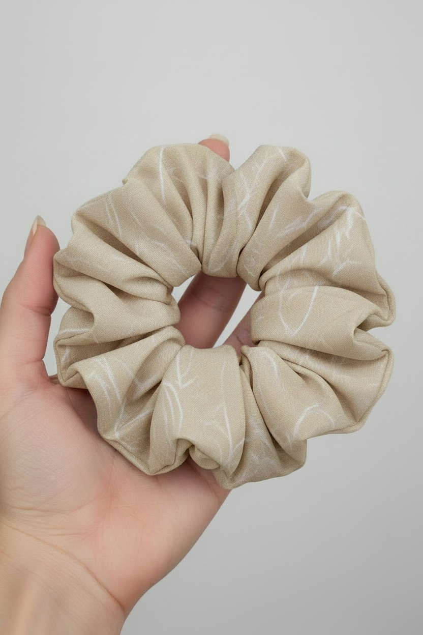 Tan Leaves Chiffon Scrunchie in Hand - With Texture